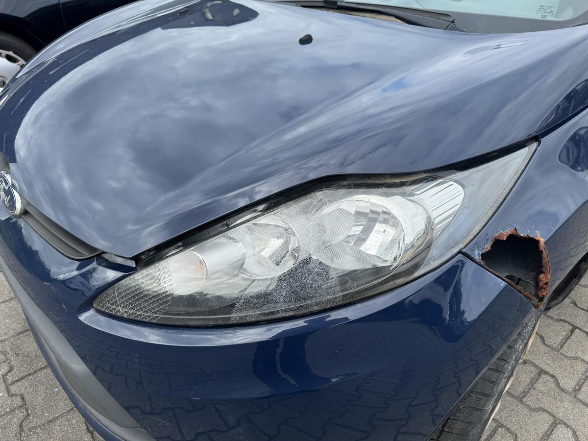 Ford Fiesta JA8 original Scheinwerfer vorn links Halogen Bj.2009